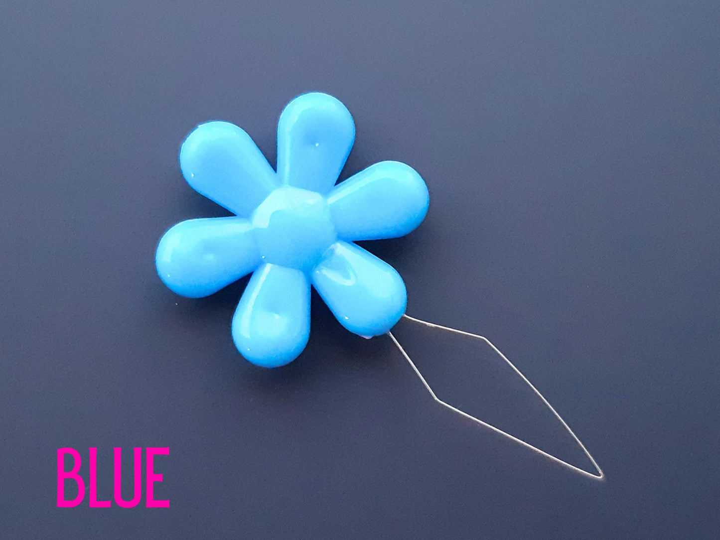 Daisy flower sewing needle threaded