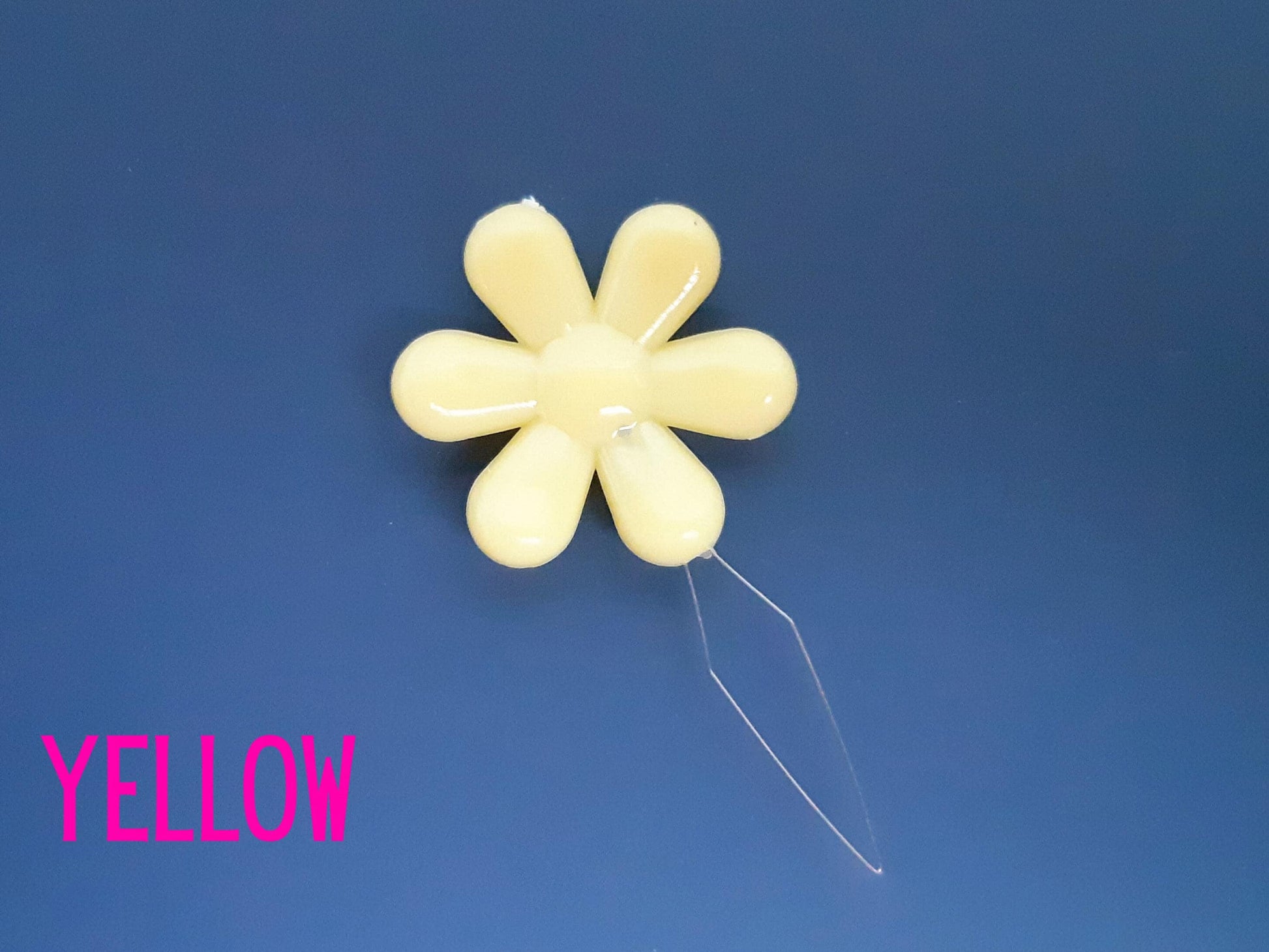 Daisy flower sewing needle threaded