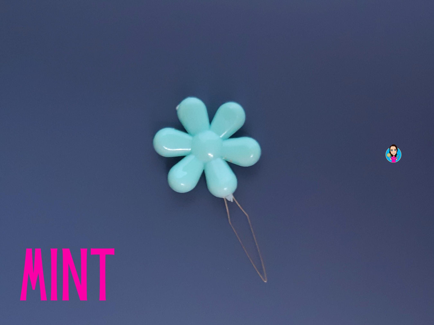 Daisy flower sewing needle threaded