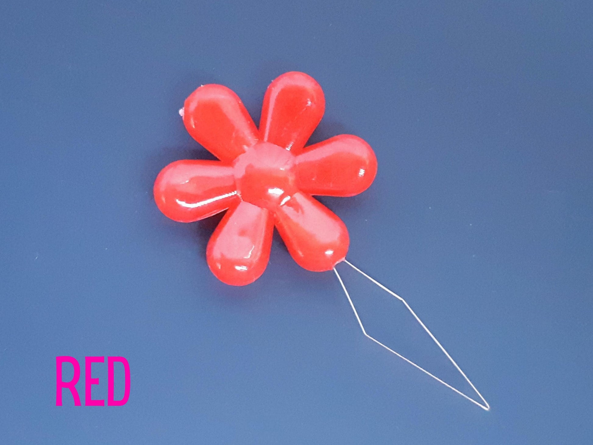 Daisy flower sewing needle threaded