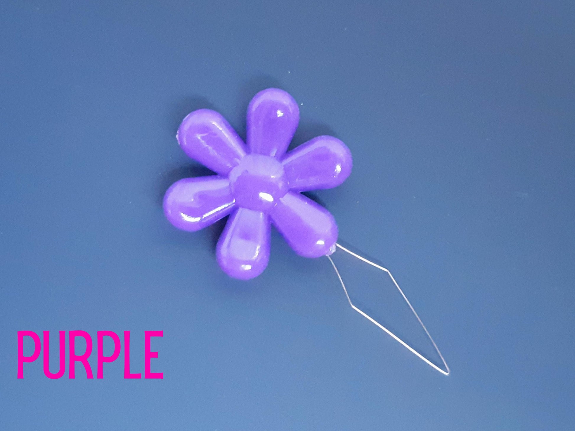 Daisy flower sewing needle threaded