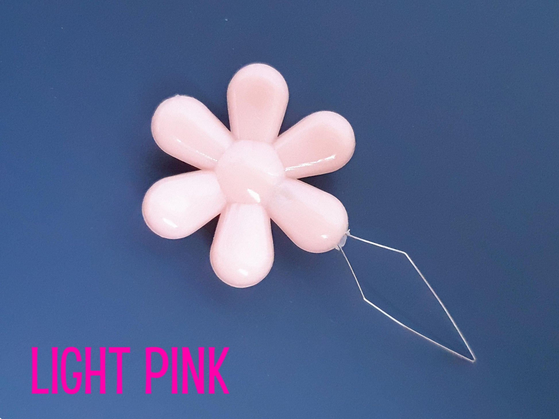 Daisy flower sewing needle threaded