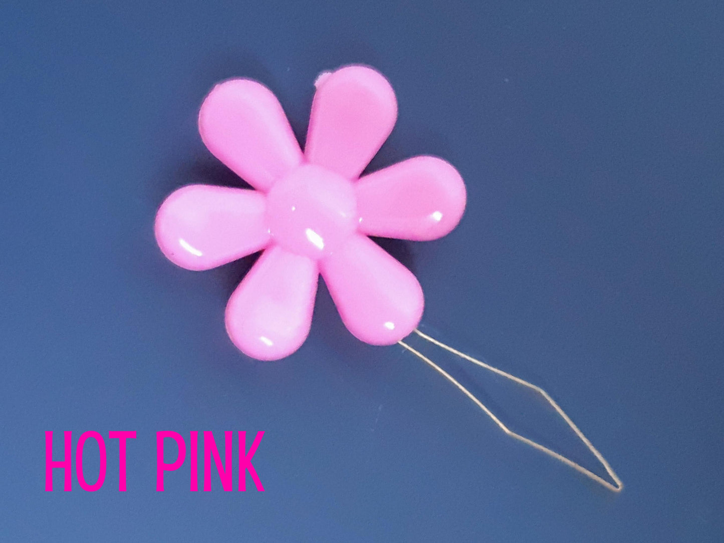 Daisy flower sewing needle threaded