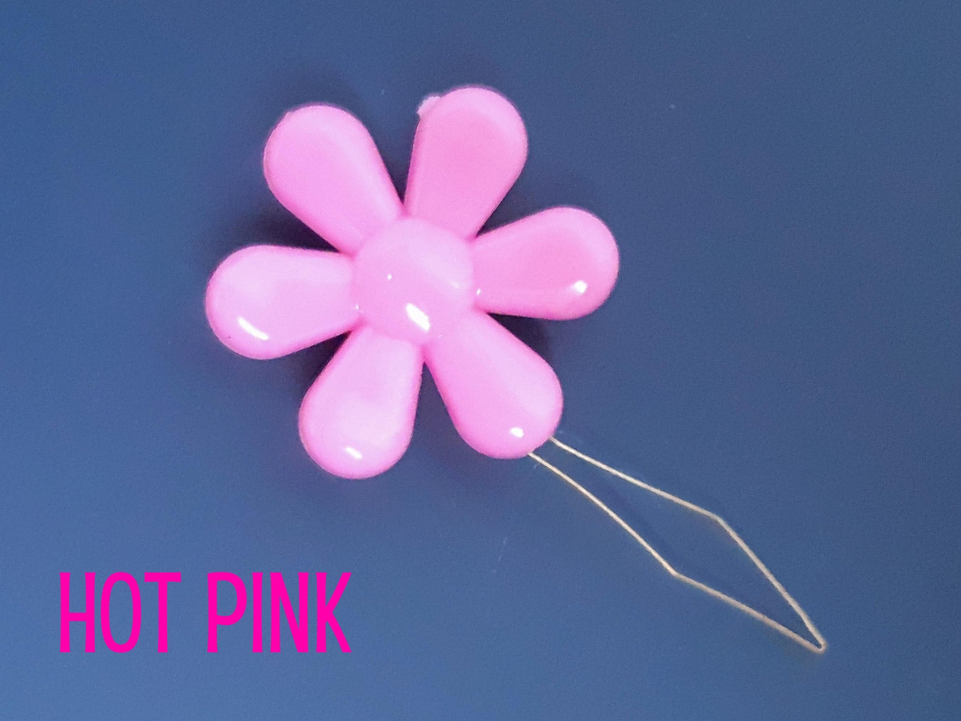 Daisy flower sewing needle threaded