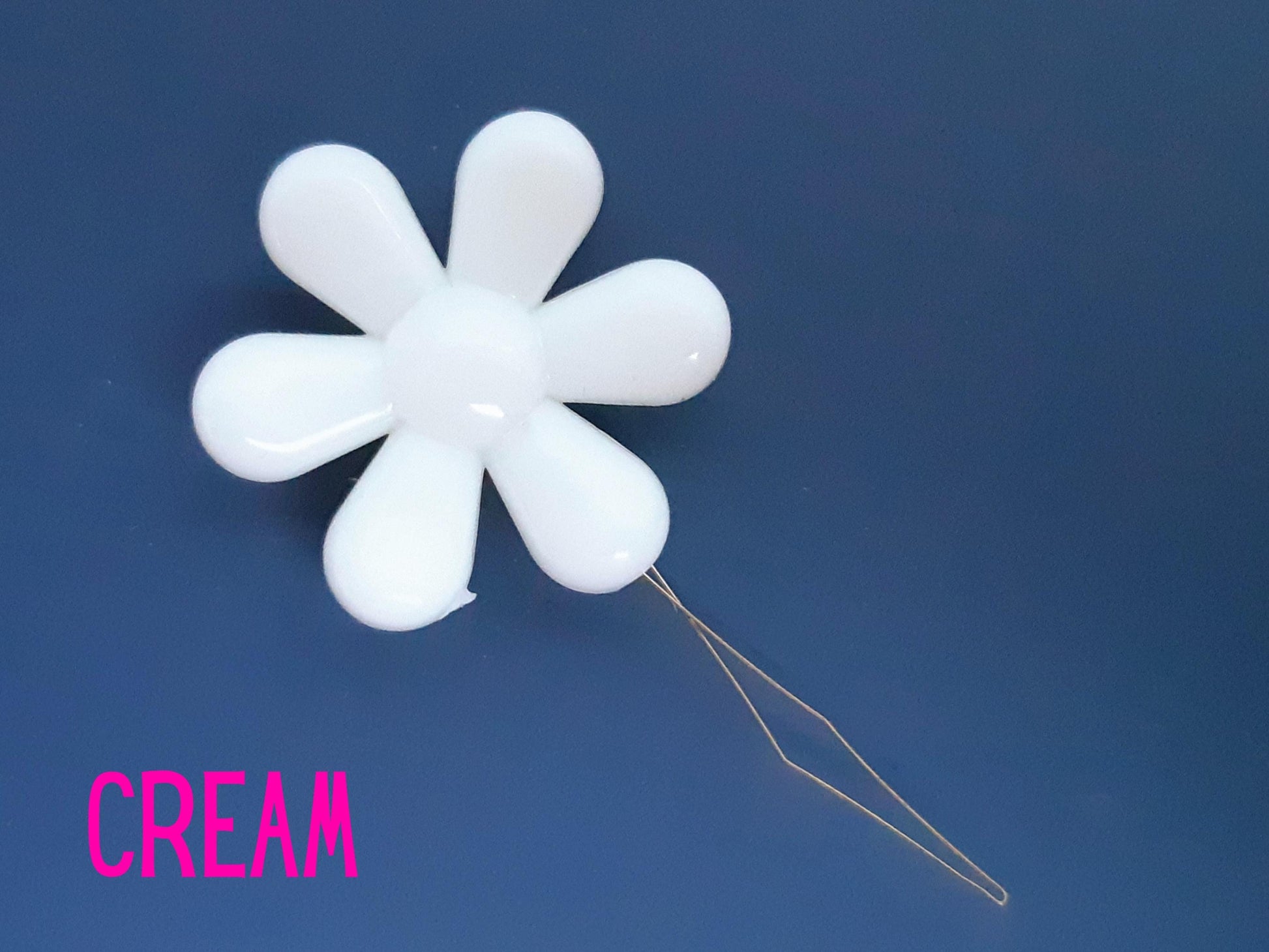Daisy flower sewing needle threaded